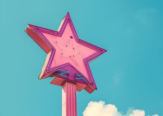 Neon Star Against Blue Sky