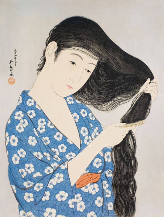 Woman Combing Her Hair