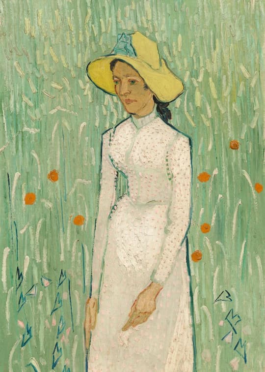 Woman in White with Yellow Hat